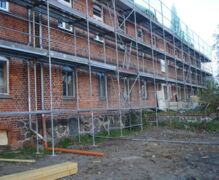 Scaffolding during replacement of roof tiles and renovation of roof beams