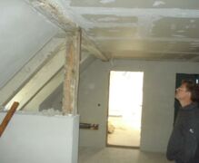 Drywall work on the ceilings in the top floor
